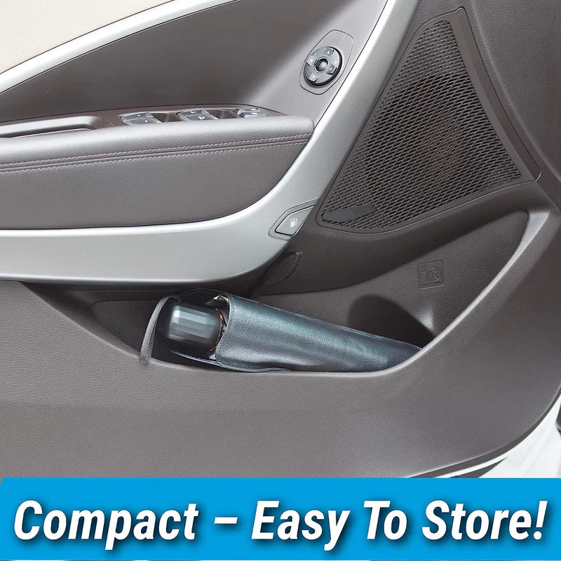 Compact windshield sun shade stored in car door